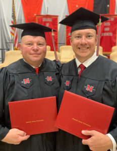 Captain Lafate Day (left) and Lieutenant Michael Beck Jr. (right) graduated with degrees in Criminal Justice on Saturday at Nicholls State University.