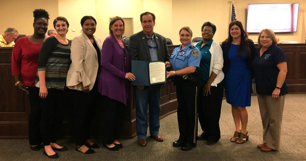 Lafourche Parish President Jimmy Cantrelle issues a proclamation for Domestic Violence Awareness Month on September 24, 2019. Pictured from left to right are Kimberly Clement (The Haven), Brittany Lodrigue (LPSO/The PACT Place), Major Renee Brinkley (LPSO), Pam Guedry (LPSO/The PACT Place), President Cantrelle, Captain Karla Beck (LPSO), Melissa Williams (The Haven), Allie Fournet (Lafourche Parish District Attorney's Office), and Geralyn Pitre (Lafourche Parish District Attorney's Office).