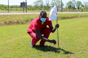 Inmate Terrell Joseph plants a white flag. 