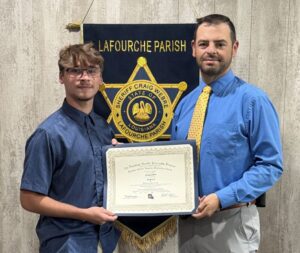 James Billiot is pictured with Captain Brennan Matherne